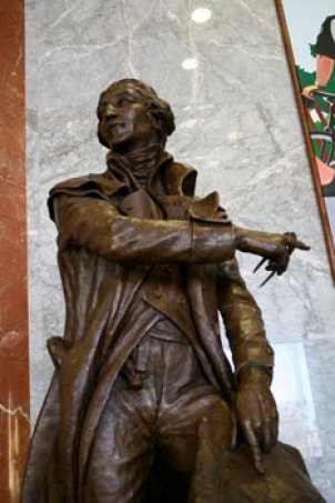 The statue is currently located inside the lobby at One Judiciary Square.