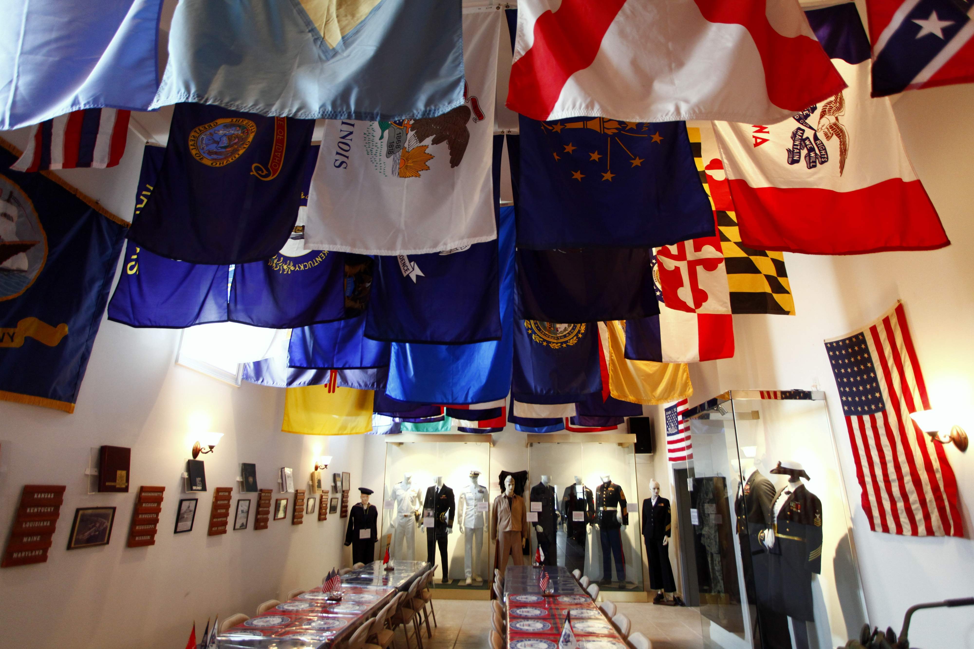 The banquet room, with state flags hanging from the ceiling
