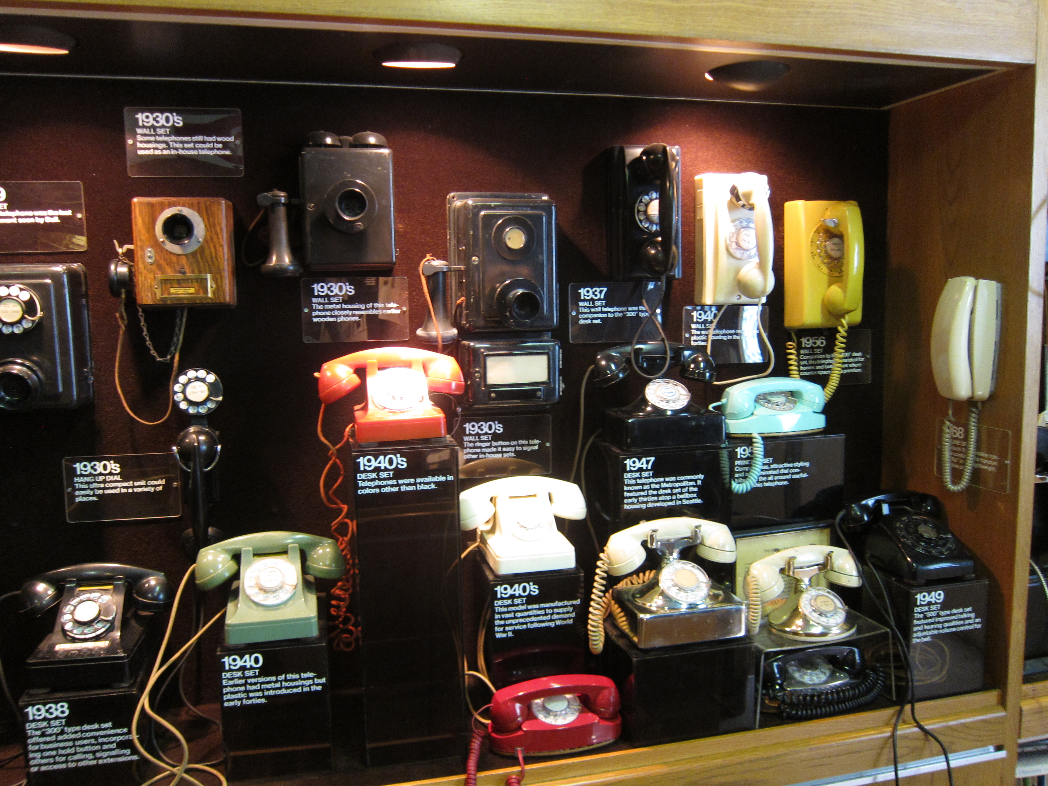 Vintage telephones on display.