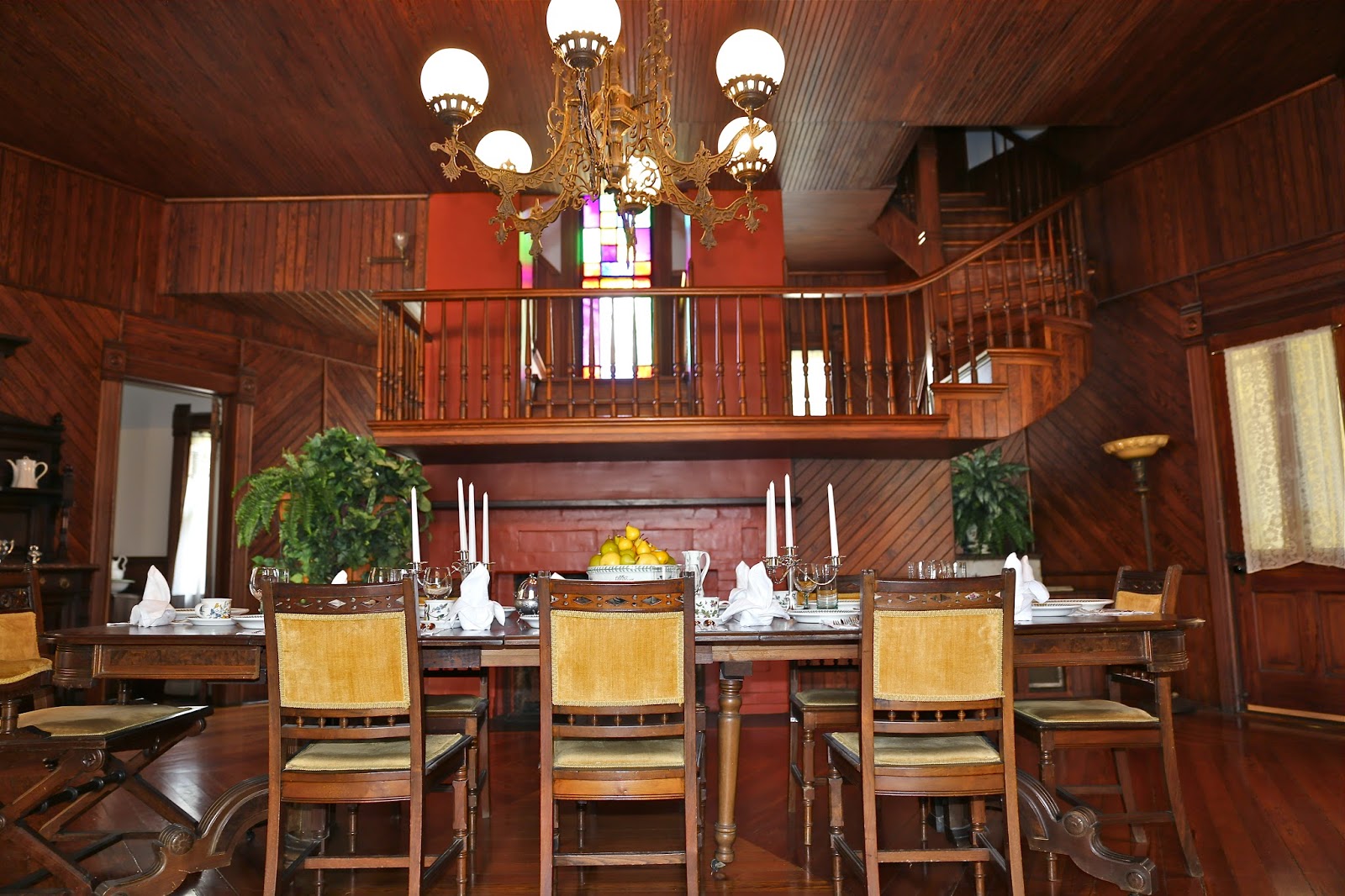 View of the dining room and the double flue chimney, with the staircase running between them