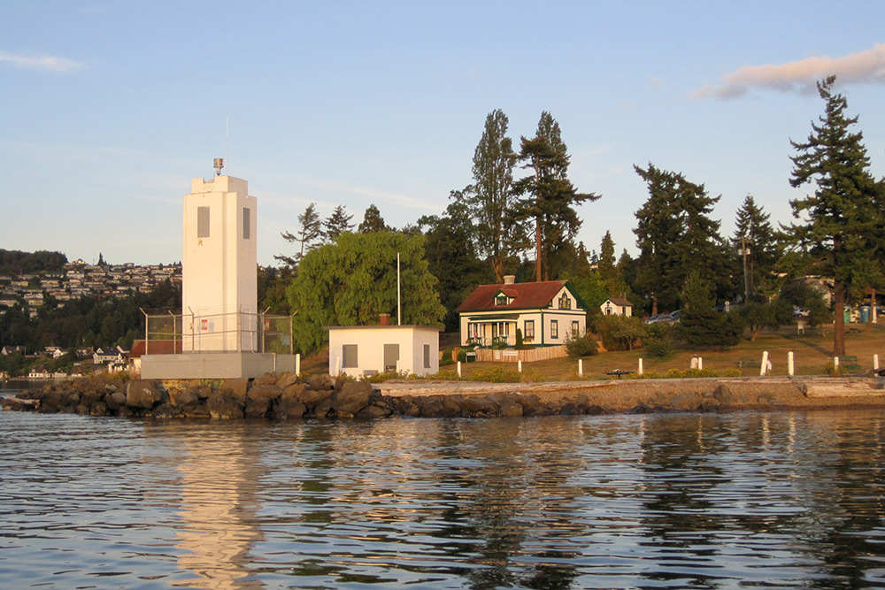 An offshore shot of the lighthouse and park.