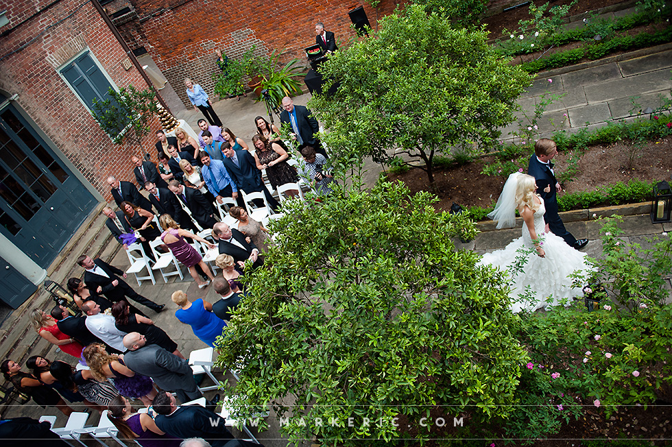 A couple celebrate their nuptials in the house's central courtyard. 