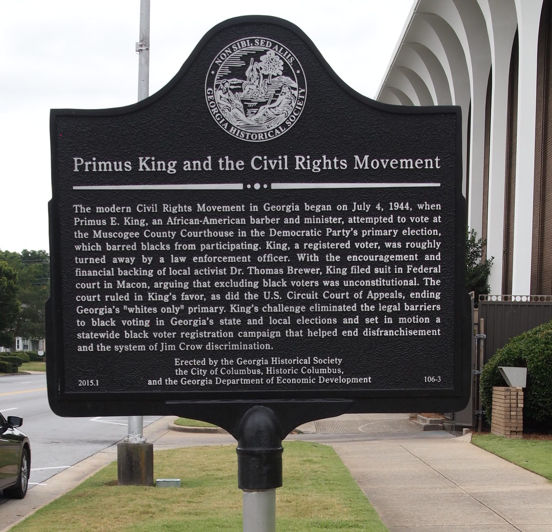 Historical marker dedicated to Primus King outside of the Muscogee County courthouse.  It reads, "The modern Civil Rights Movement in Georgia began on July 4, 1944, when Primus E. King, an African-American barber and minister, attempted to vote at the Muscogee County Courthouse in the Democratic Party’s primary election, which barred Blacks from participating. King, a registered voter, was roughly turned away by a law enforcement officer. With the encouragement and financial backing of local activist Dr. Thomas Brewer, King filed suit in Federal court in Macon, arguing that excluding Black voters was unconstitutional. The court ruled in King’s favor, as did the U.S. Circuit Court of Appeals, ending Georgia’s “whites only” primary. King’s challenge eliminated the legal barriers to Black voting in Georgia’s state and local elections and set in motion a statewide Black voter registration campaign that helped end disfranchisement and the system of Jim Crow discrimination."