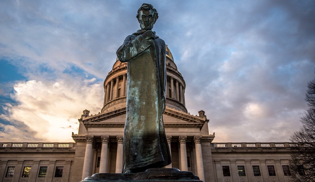 The statue in front of the capitol building