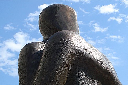 Sister statues are erected in Richmond, Liverpool, and Benin.