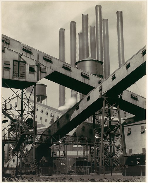 An iconic photo by Charles Sheeler of conveyors at the plant