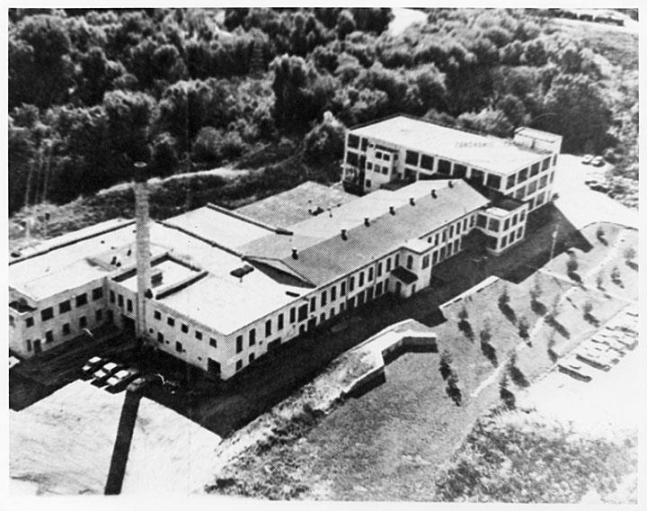 A black and white aerial photograph of the mill.