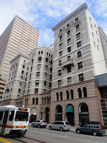 The floor plan of the Equitable Building resembles two "E"s placed back to back, as this view from Stout Street reveals. Photo by Paul Sableman. Licensed under Creative Commons.