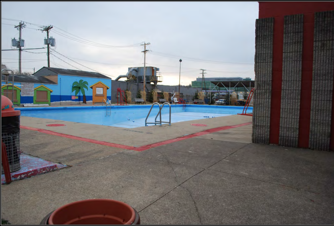 Overview of the swimming pool area, looking to the southeast