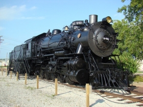 A black train locomotive.