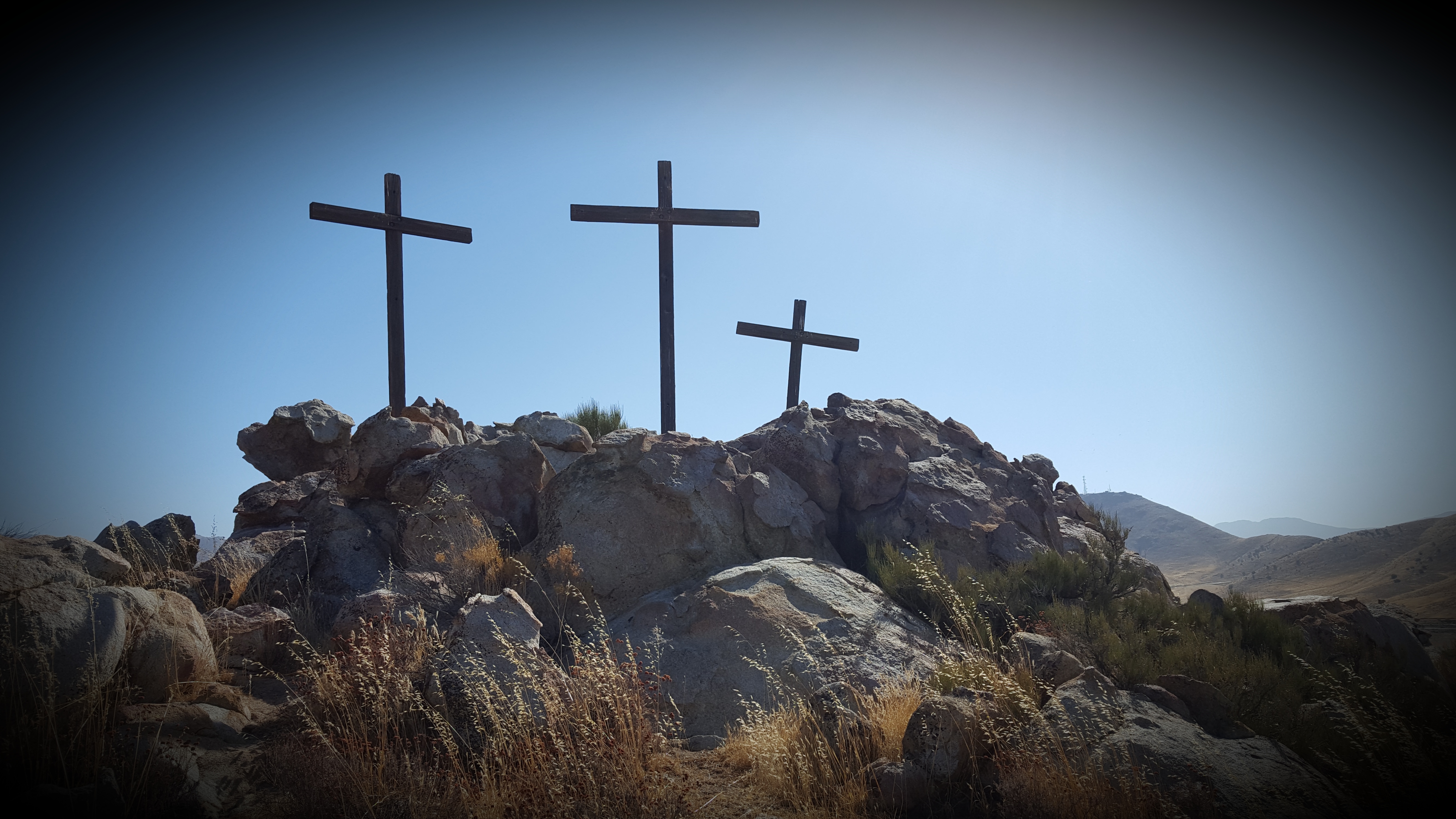 The three crosses represent the memorial for the Keyesville Massacre. The crosses are set a few miles away from the actual site, due to dangers trying to reach the site.
