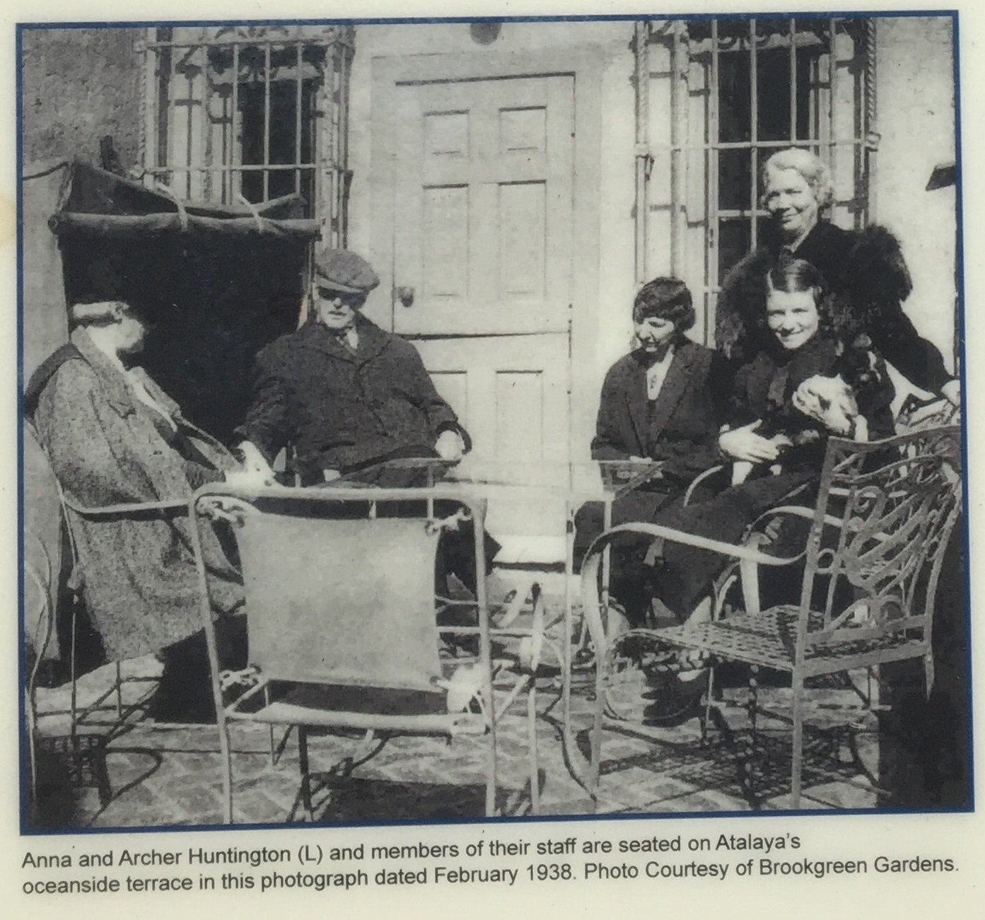 Anna and Archer Huntington (L) and members of their staff are seated on Atalaya's oceanside terrace in this photograph dated February 1938. Credit: Brookgreen Gardens