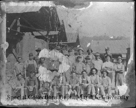 Workers at Ensign Manufacturing, circa 1899