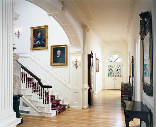 The first floor of the Rosenbach's period house museum that features portraits by Gilbert Stuart and Thomas Sully.