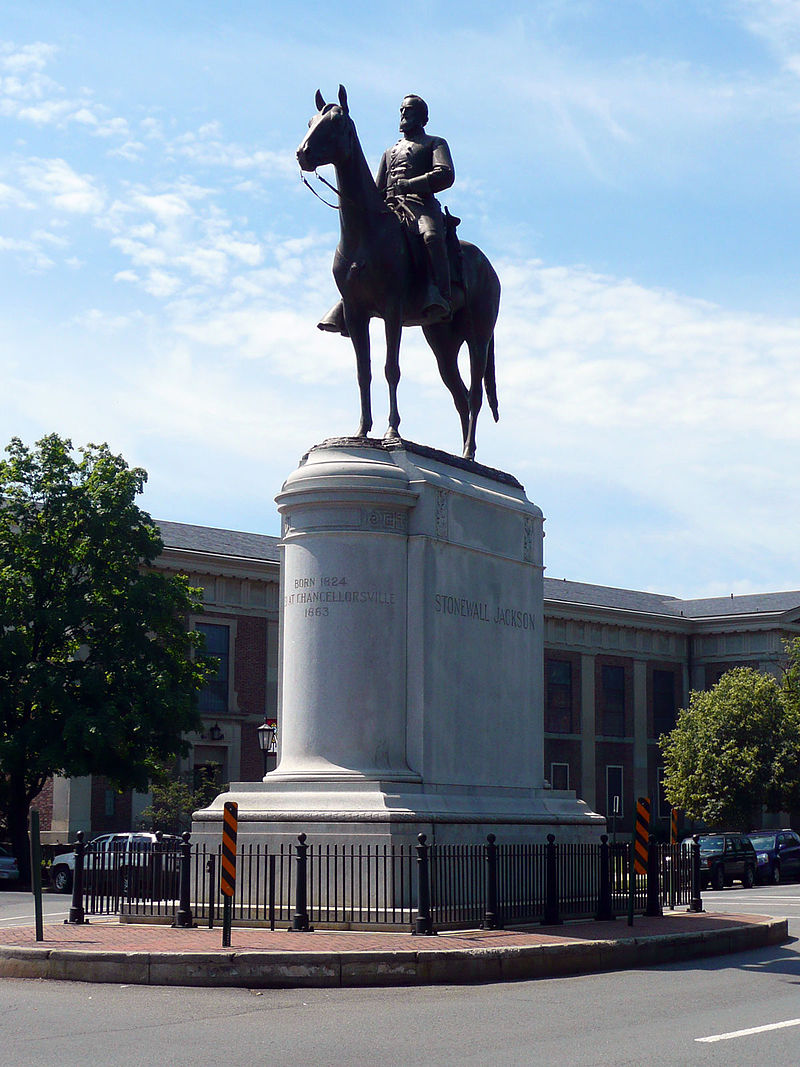 The Stonewall Jackson Monument features a granite base and a bronze equestrian sculpture. 