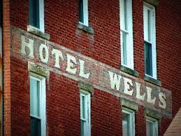 "Hotel Wells," printed on the side of the building.