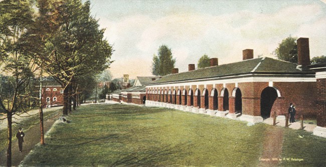 Postcard of West Range near the middle the pediment of "Hotel C". To its left is the tower of the University Chapel. At the very left the Anatomical Theatre (also designed by Thomas Jefferson).