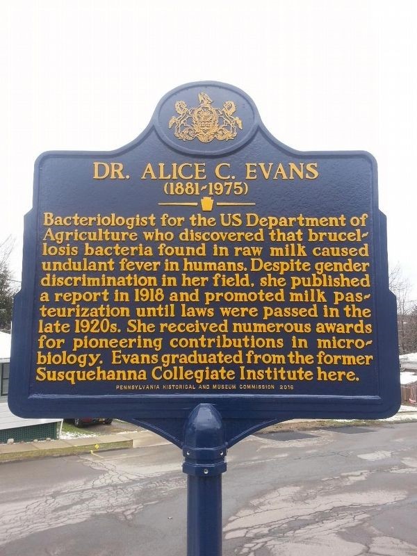 The marker located near the former Susquehanna Collegiate Institute, where Evans graduated from.