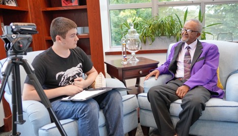 Michael Brown, HCC student interviewing husband of Patricia; William Stamps