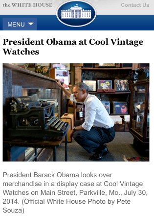 President Barack Obama looks over merchandise in a display case at Cool Vintage Watches on Main Street, Parkville, MO, July 30, 2014. (Official White House photo by Pete Souza)