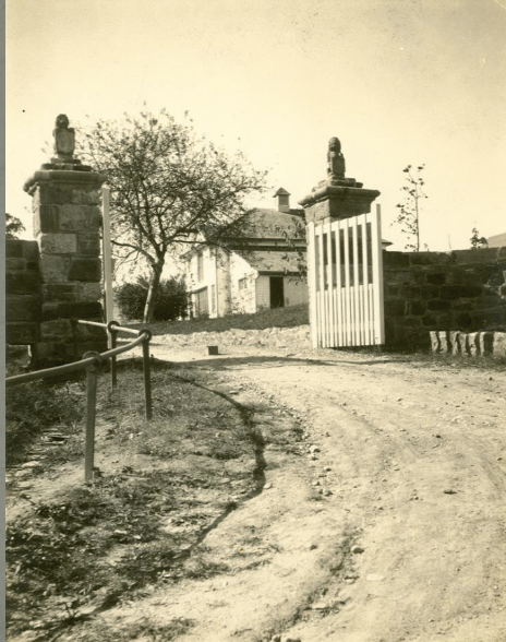 Gate with lions, circa 1920 