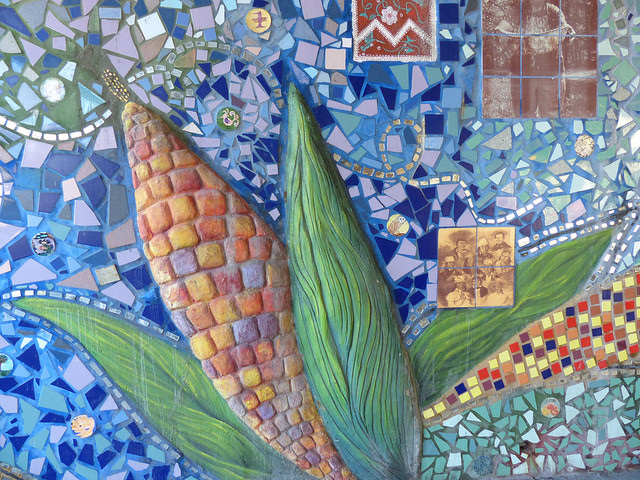 Close up of detail work on mural, highlighting the variety of mixed-media used in the mural. Photo Credit Steve Silverman, 2012.