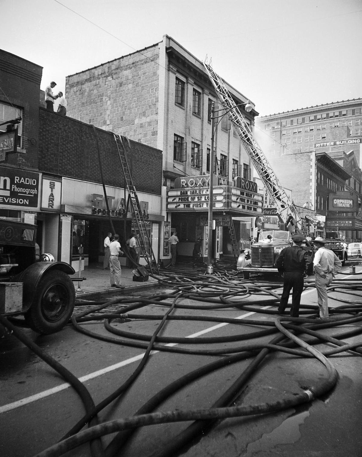 Firefighters respond to the fire at the Roxy on August 25, 1952