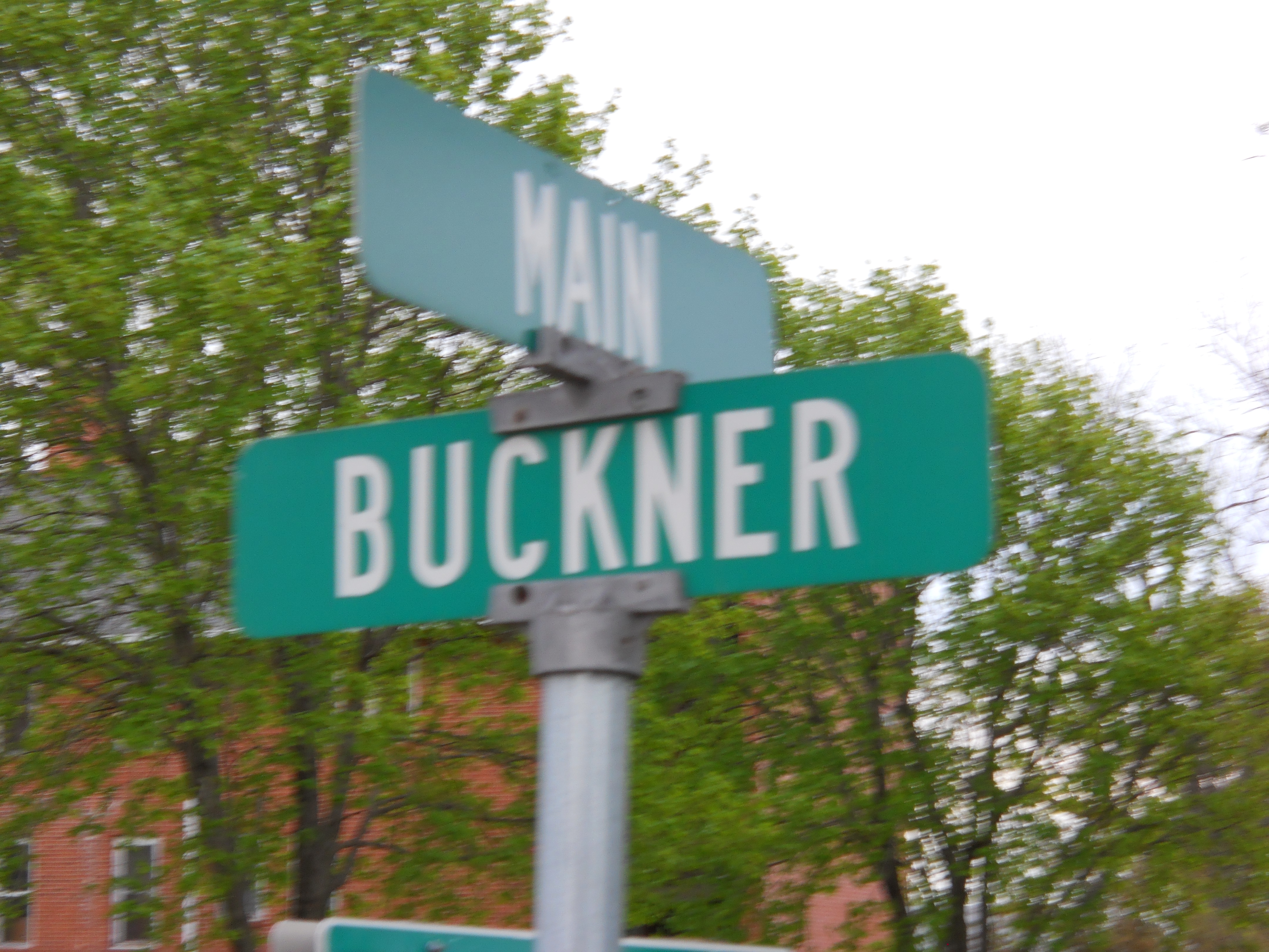 Corner of Main and Buckner.  Buckner street is named in memory of Mayo Hazeltine Buckner.