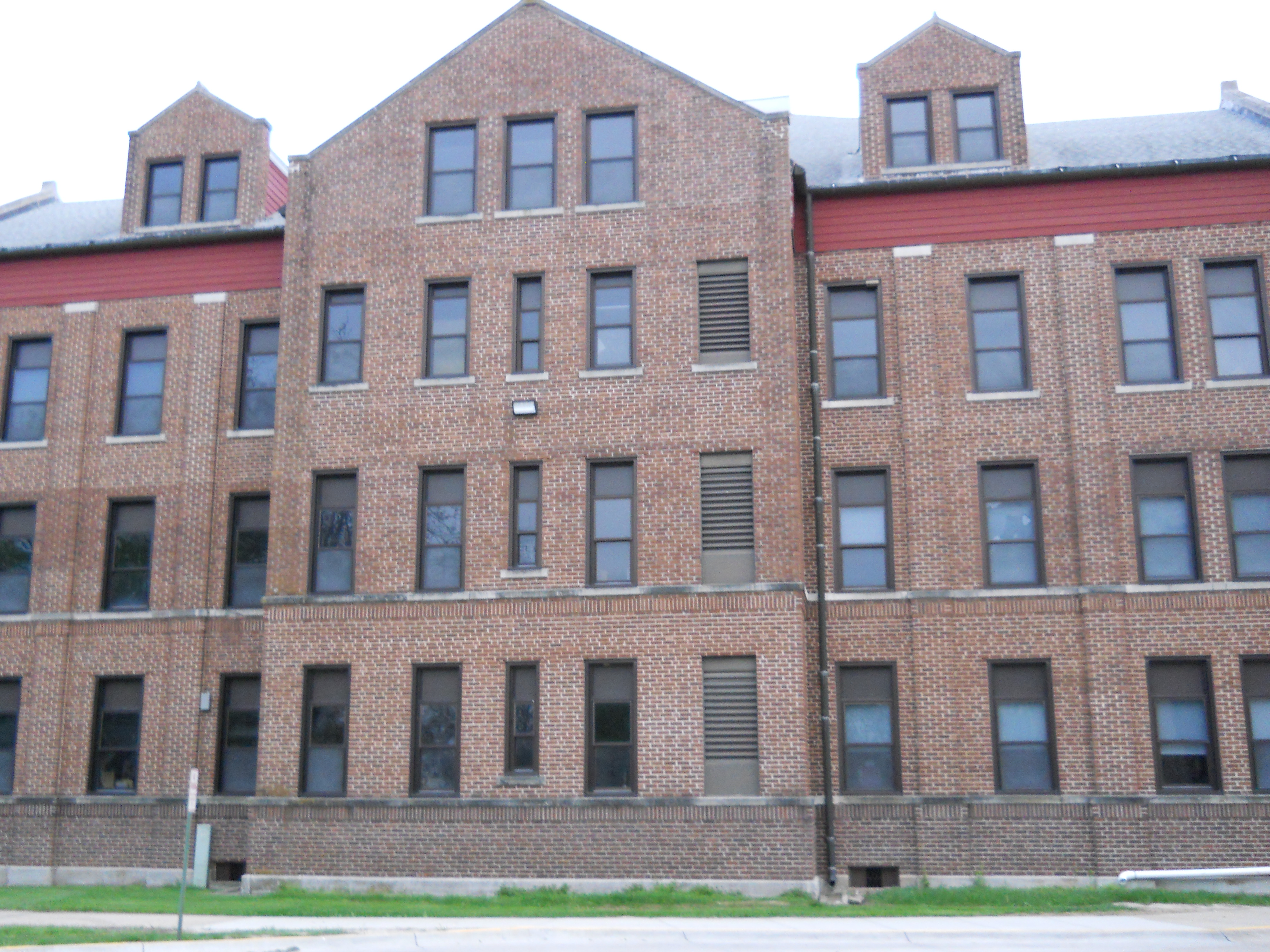 Side view of former Juvenile Girls Cottage. Facing South.