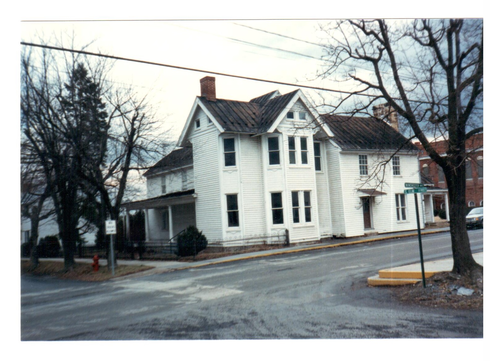 Higgins House (far left) as part of larger structure, c. late 980's