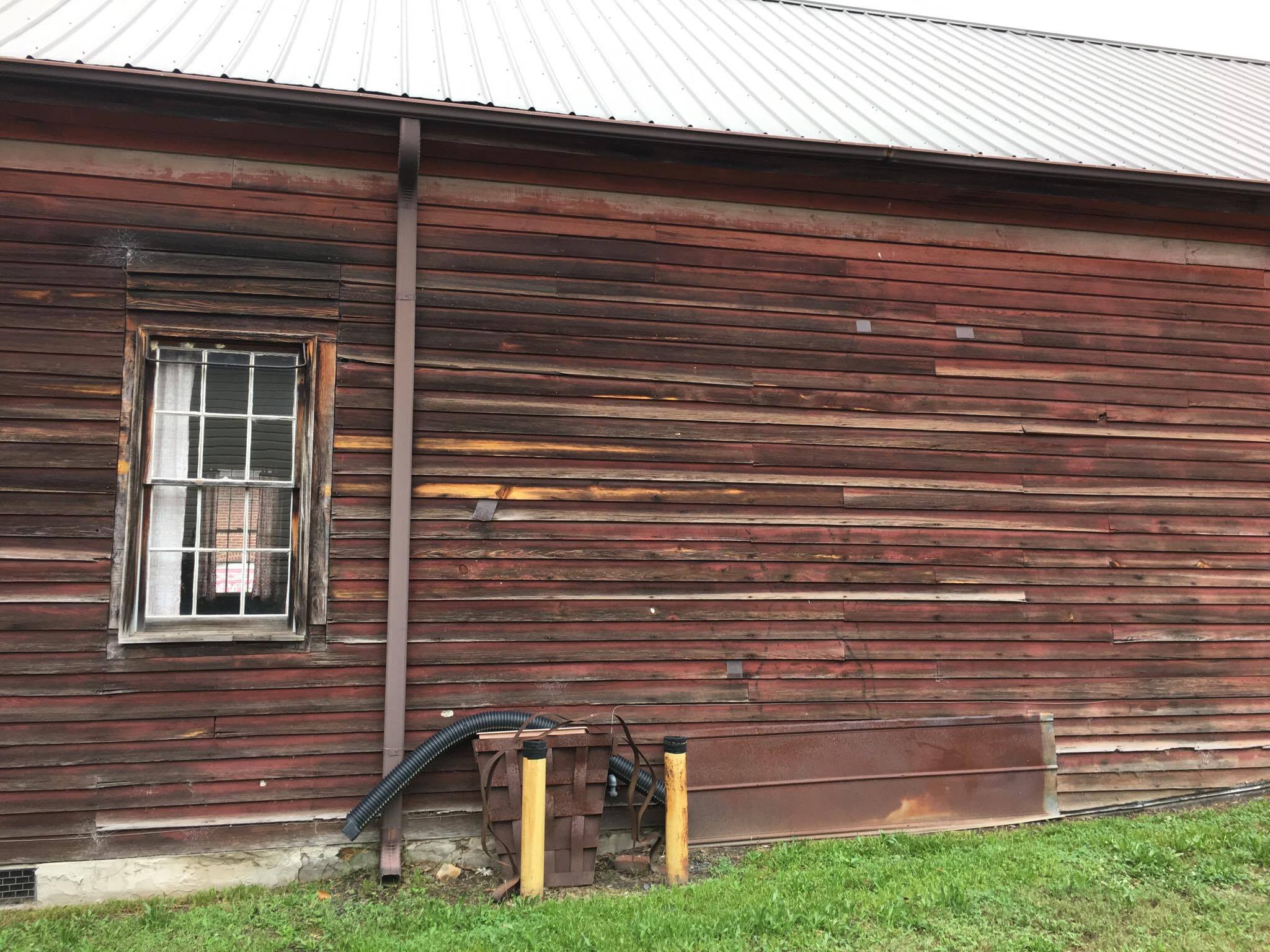 The middle section of the left side of the house