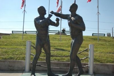 The statue was dedicated in 1988 and depicts the first world championship fight.
