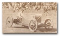 Barney Oldfield, racing.