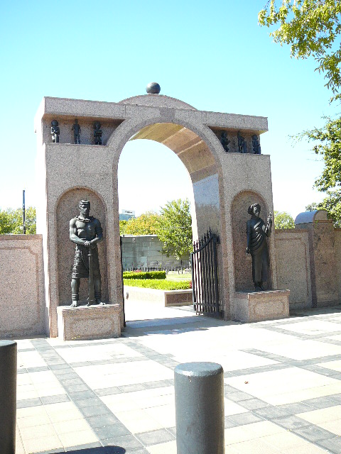 Arched granite entrance into the cemetery.