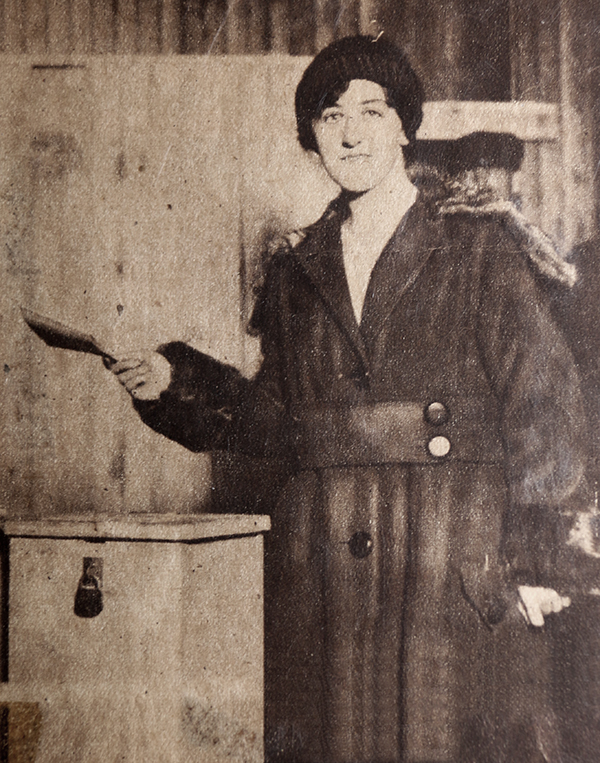 Florence B. Chauncey casting the very first women's vote in a New York State political election, January 5, 1918, 6:10am.