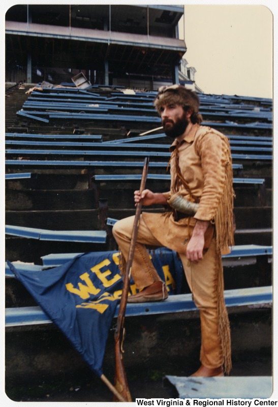 The Mountaineer, WVU's mascot, stands in the abandoned Mountaineer Field in 1987.