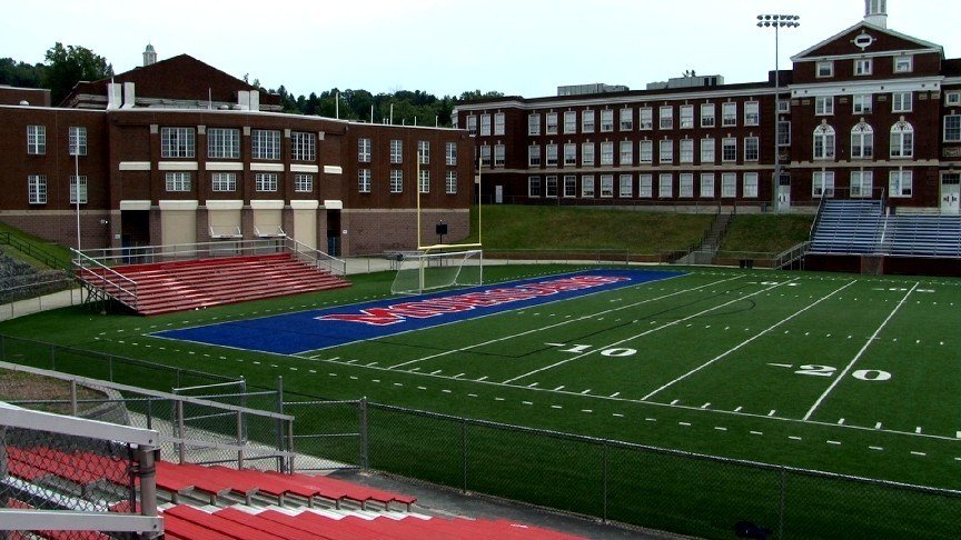 An interior perspective of the school's Pony Lewis Field and original structure.