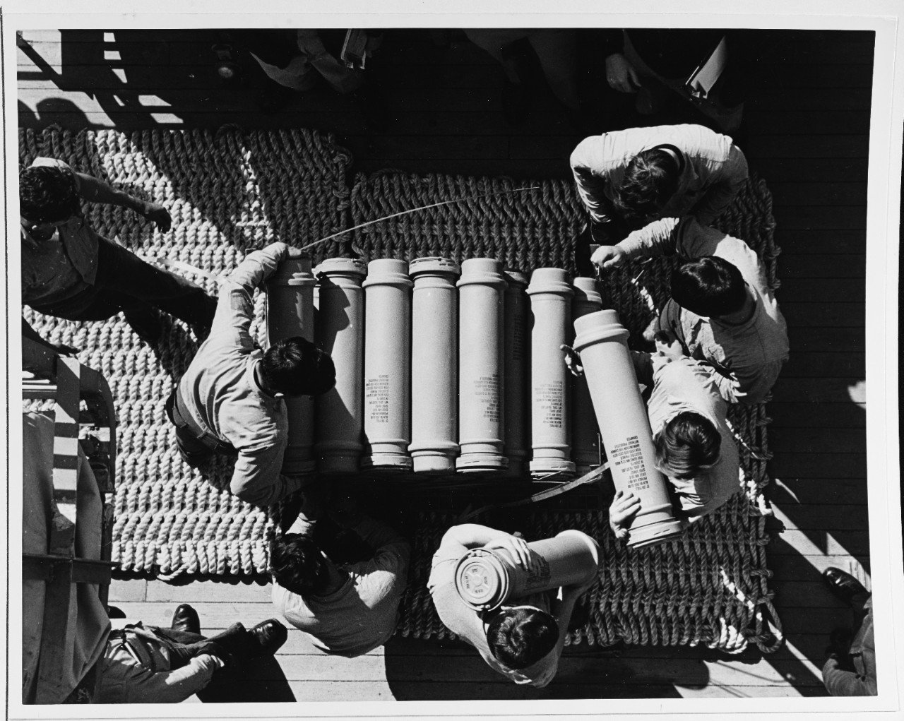 Sailors stowing powder cans for the 5" guns of USS New Jersey's secondary battery, 1968. Unlike her sister Iowa-class battleships, New Jersey served through the Vietnam War. (NHHC)