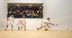Here players are seen competing in a squash tournament inside the club.