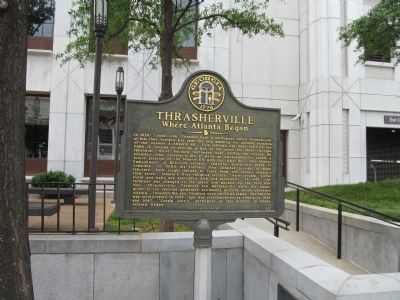 The marker is located outside of the State Bar of Georgia building.