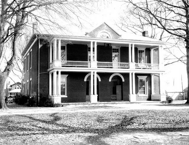 A second story was added to the porch of the Princess Anne County Courthouse in 1918, creating a two-tiered, full-width Tuscan-columned entry porch.