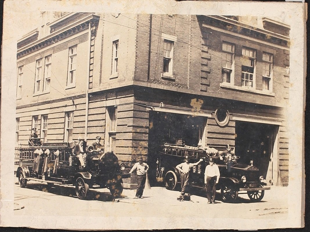 This c.1910 photograph shows the men and equipment of Reily Hose Company #10 outside the fire house.