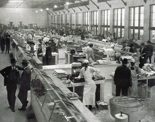 Photo showing the busy marketplace in 1924. City Fathers didn't believe that the concert hall alone would pay for their $3,000,000 investment. During the first few years after opening, the income from the rental of the marketplace actually earned the