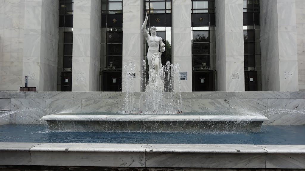 The fountain and 12-foot marble statue at the Front Street entrance to the courthouse.  