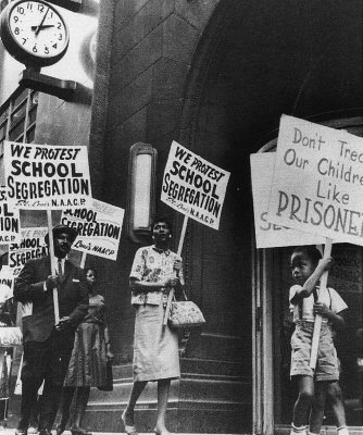 Image of a typical protest of school segregation.