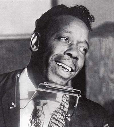 Slim Harpo with harmonica