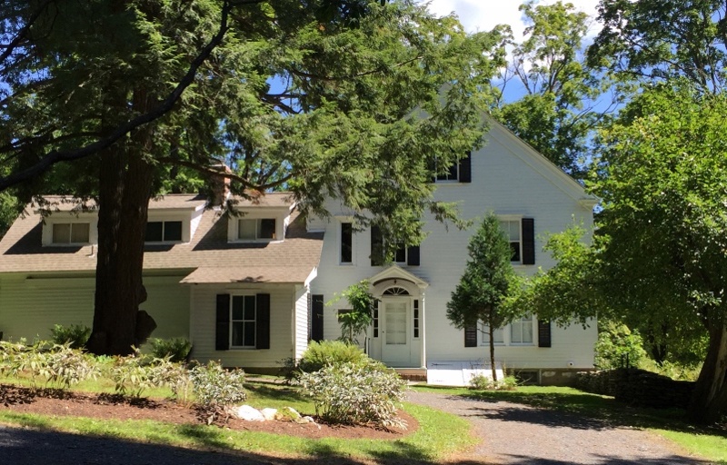 An exterior view of Steepletop. Despite Millay's jetset lifestyle in Greenwich Village, New York, she maintained a steady need for silence and isolation to remain productive.