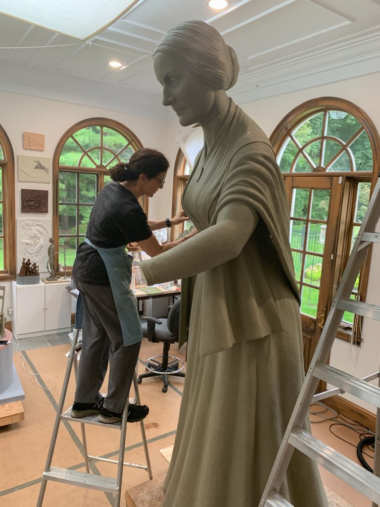 Renowned sculptor Meredith Bergmann working on the monument in her studio