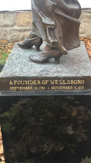 Inscribed on the statue are the birth and death dates of Mary Wells Morris--a co-founder of Wellsboro.