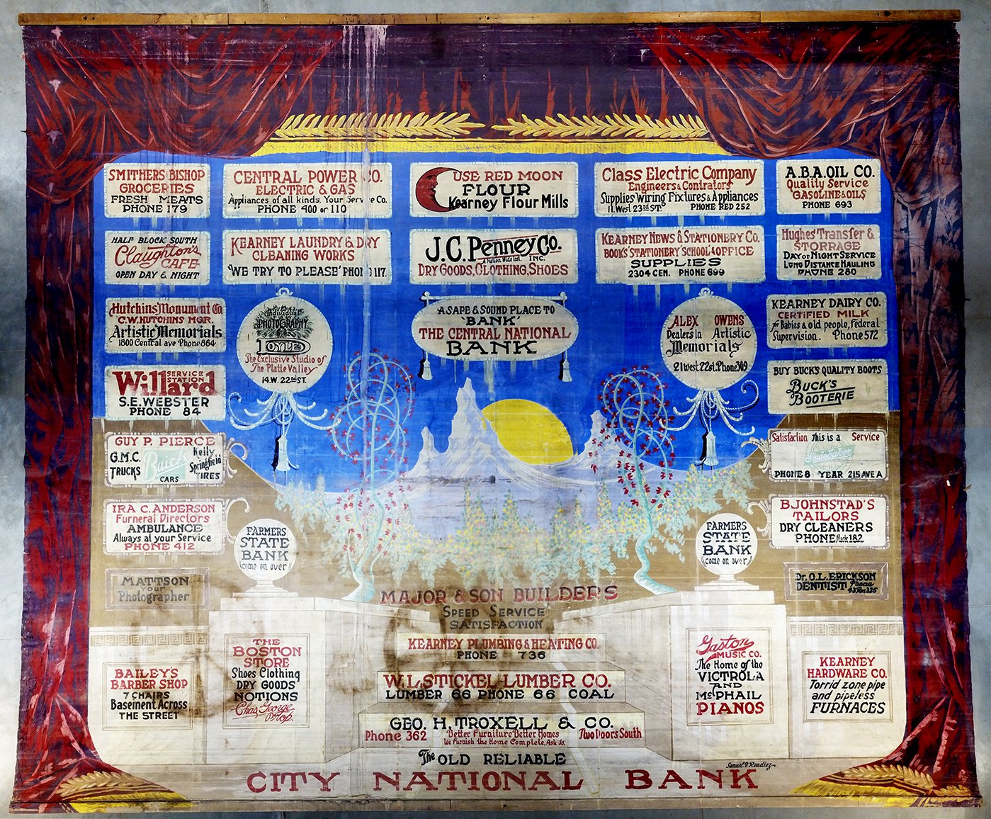 This advertising curtain is one of the few remaining artifacts related to the Kearney Opera House.